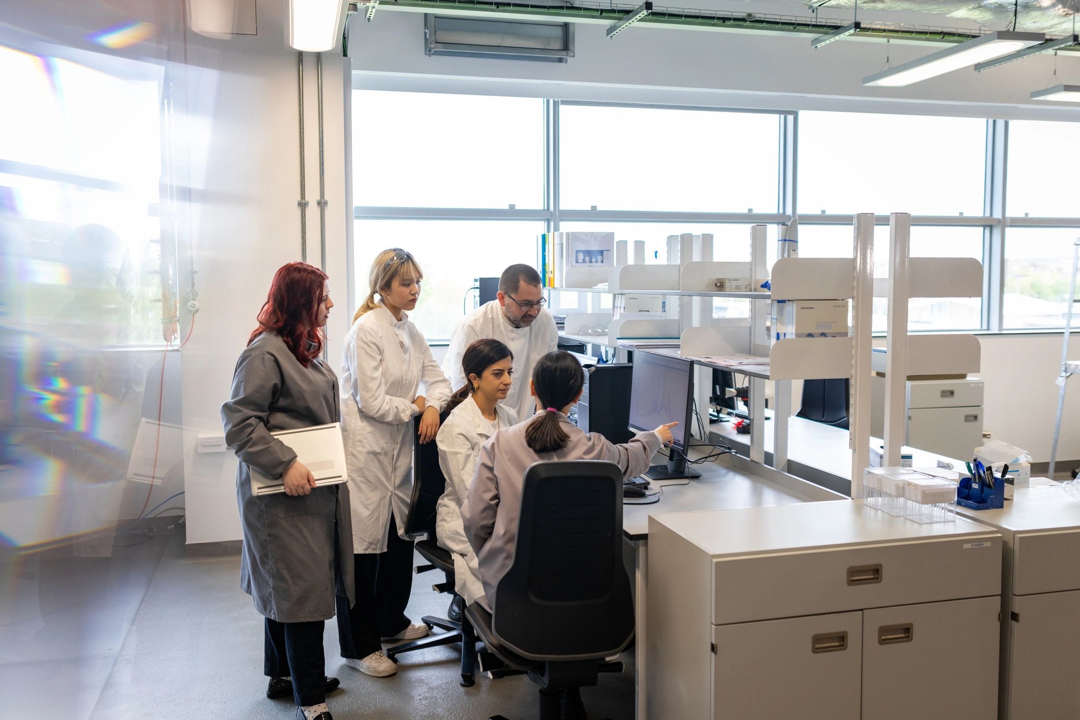 Quality professionals reviewing inspection documentation in a regulated environment
